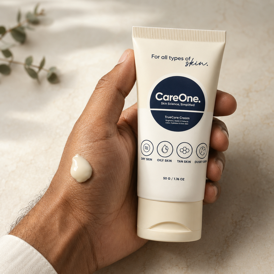 Man holding TrueCare Cream with cream swatch